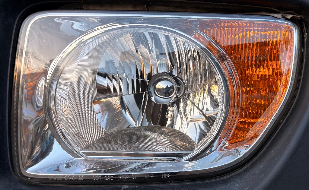 Headlight Restoration by Slums Mobile Detailing